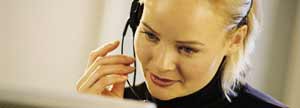 Woman on phone using headset