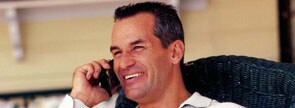 Man on cell phone at home
