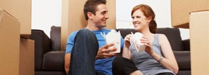 Couple with moving boxes