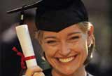 Woman wearing mortar board and holding degree