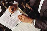 Business person reviewing papers