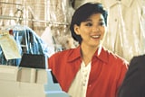 Lady managing a dry cleaning store.