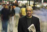 A businessman on a city street.