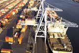A ship being loaded with cargo.