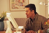 Man sitting at a computer