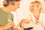 happy couple cooking