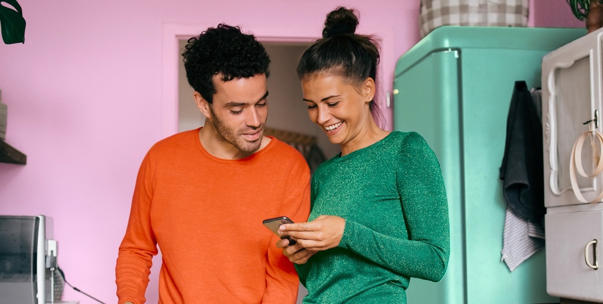 A couple checking a phone